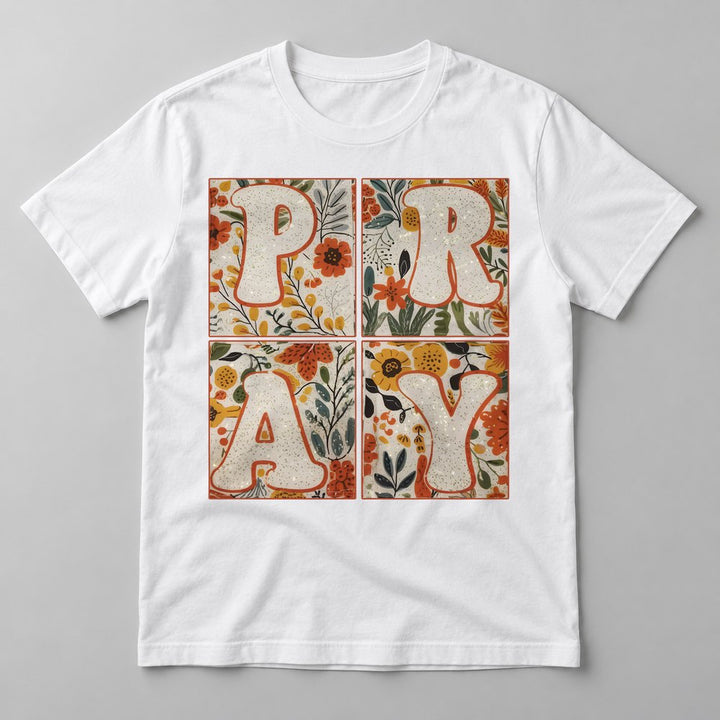 Pray Floral pressed on a White tee